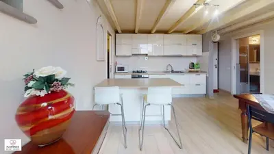 Cucina o angolo cottura di Loft Matteotti by Florence Sweet Homes