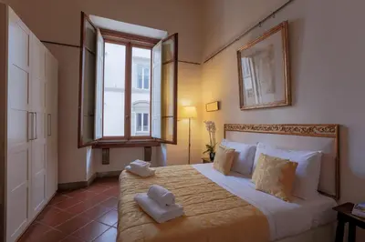 Letto o letti in una camera di Firenze Suite Art