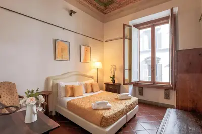 Letto o letti in una camera di Firenze Suite Art