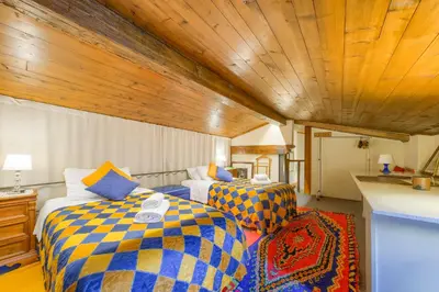 Letto o letti in una camera di Casa Strozzi - (PIAZZA DELLA REPUBBLICA)