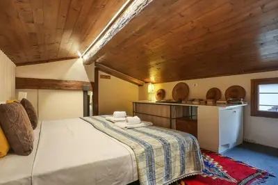 Letto o letti in una camera di Casa Strozzi - (PIAZZA DELLA REPUBBLICA)