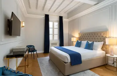 Letto o letti in una camera di Bargello Penthouse Luxury Apartment In Florence By Palazzo Pazz Vitali