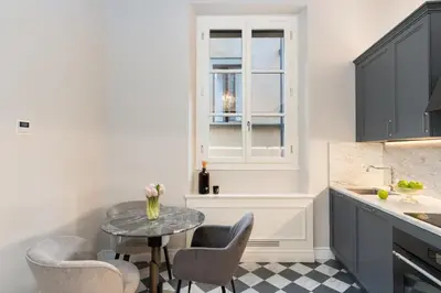 Cucina o angolo cottura di Bargello Penthouse Luxury Apartment In Florence By Palazzo Pazz Vitali