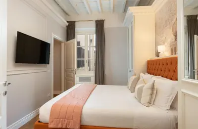 Letto o letti in una camera di Bargello Penthouse Luxury Apartment In Florence By Palazzo Pazz Vitali