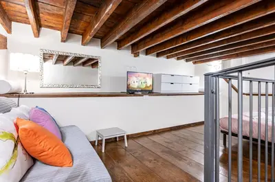 Letto o letti in una camera di GuestHost - Il Covo di Camillo - Central and Charming Apartment