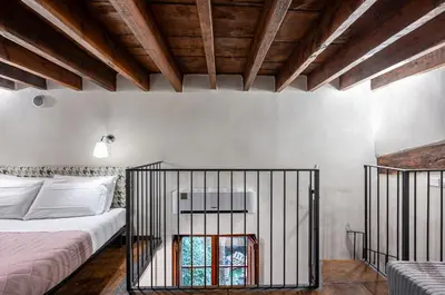 Letto o letti in una camera di GuestHost - Il Covo di Camillo - Central and Charming Apartment