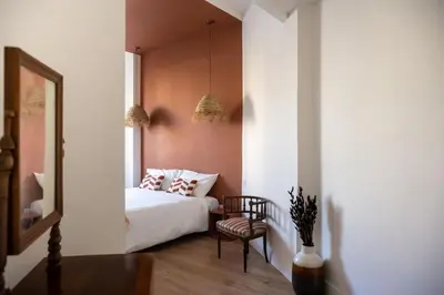 Letto o letti in una camera di Appartamento Boho chic