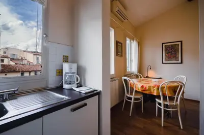 Cucina o angolo cottura di Puccini Apartment With Terrace
