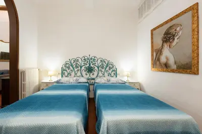 Letto o letti in una camera di Keys of Italy - Allegri 11 - 2 bedrooms Nearby Santa Croce
