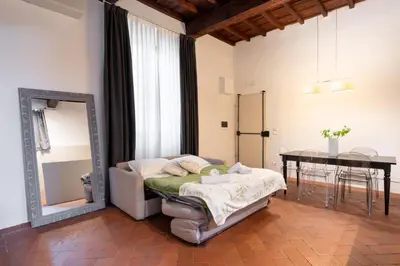 Letto o letti in una camera di Keys of Italy - Albero 15 - Big and Small apt by Train station 2nd floor