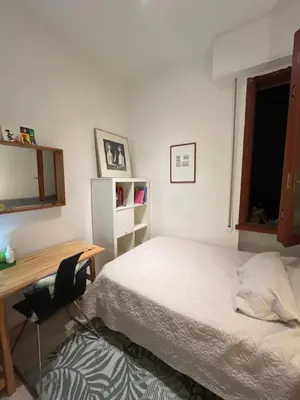 Letto o letti in una camera di Monolocale Firenze Robbia
