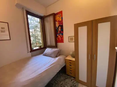 Letto o letti in una camera di Monolocale Firenze Robbia
