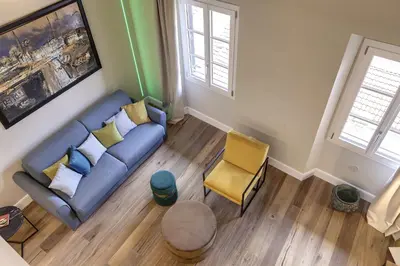 Area soggiorno di Sant'Agostino Luxury Apartment by Mamo Florence
