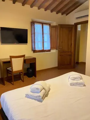 Letto o letti in una camera di Casale dei cento Acri