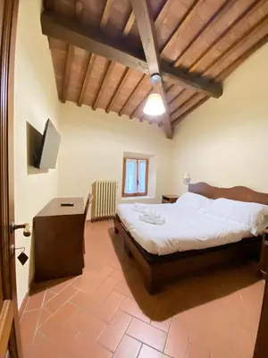 Letto o letti in una camera di Casale dei cento Acri