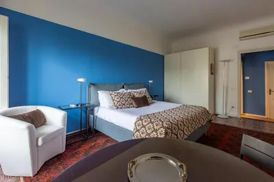 Letto o letti in una camera di Angelica House