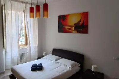 Letto o letti in una camera di Casa Giafer Apt luminoso spazioso ben localizzato