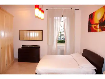 Letto o letti in una camera di Casa Giafer Apt luminoso spazioso ben localizzato