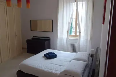 Letto o letti in una camera di Casa Giafer Apt luminoso spazioso ben localizzato