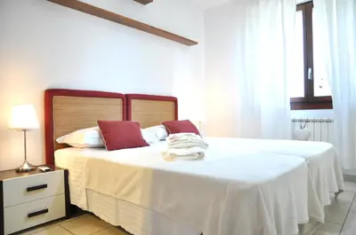 Letto o letti in una camera di La casa del Bianconiglio