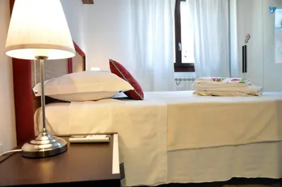 Letto o letti in una camera di La casa del Bianconiglio