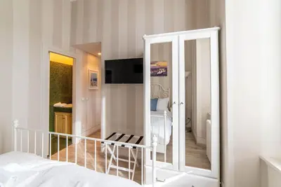 Letto o letti in una camera di Casina Ridolfi - Bilocale con quattro posti letto