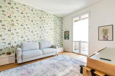 Area soggiorno di GuestHost - Florence Charme Superior Apartment with Balcony