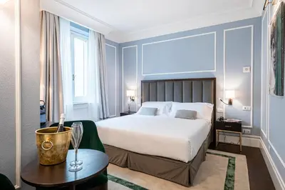 Letto o letti in una camera di Glimpse Hotel