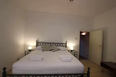 Letto o letti in una camera di Oltrarno San Niccolò Loft