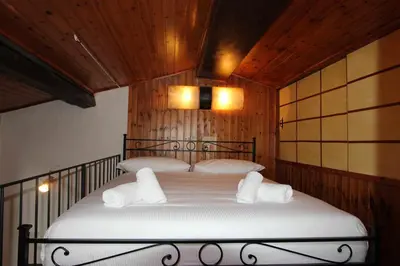 Letto o letti in una camera di Oltrarno San Niccolò Loft