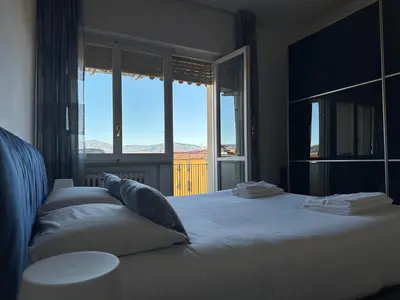 Letto o letti in una camera di Appartamento Imperia • Firenze
