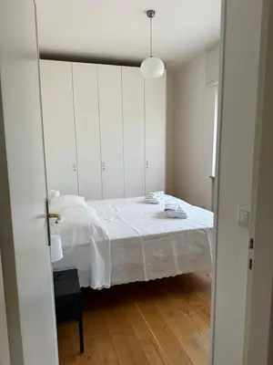 Letto o letti in una camera di Appartamento Imperia • Firenze