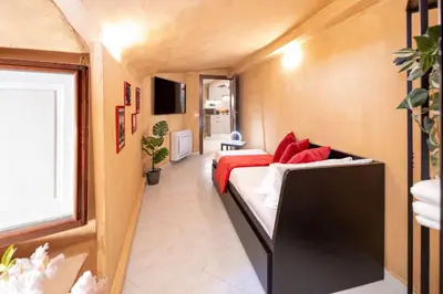 Letto o letti in una camera di Condotta House Firenze