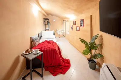 Letto o letti in una camera di Condotta House Firenze