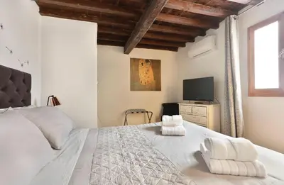 Letto o letti in una camera di Residenza Vasariano