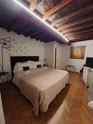 Letto o letti in una camera di Residenza Vasariano