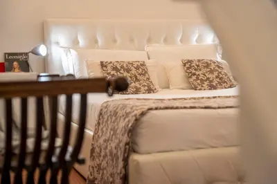 Letto o letti in una camera di Tintori art loft
