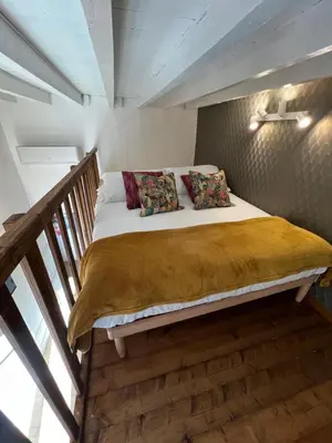 Letto o letti in una camera di Flo Liberta’ Suite Wood