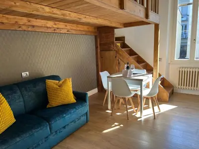 Area soggiorno di Flo Liberta’ Suite Wood