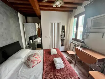 Letto o letti in una camera di Mini Studio very Central close to the Train Station