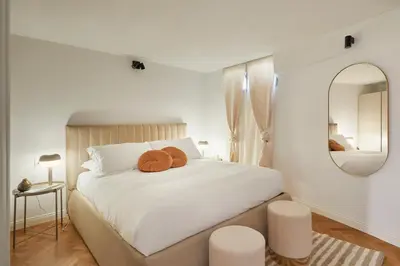 Letto o letti in una camera di Duomo Luxury FillYourHomeWithLove Design Apartment