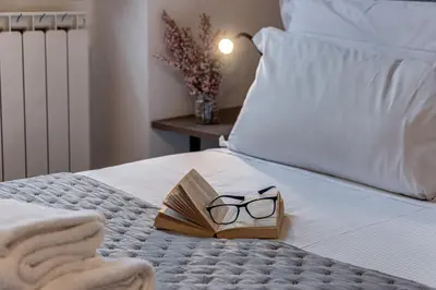 Letto o letti in una camera di LuVi House - Sweet Dreams in Florence