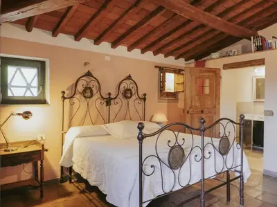 Letto o letti in una camera di Villa Peramonda