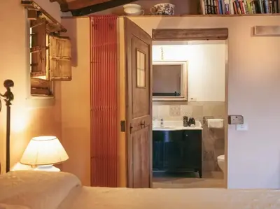 Letto o letti in una camera di Villa Peramonda