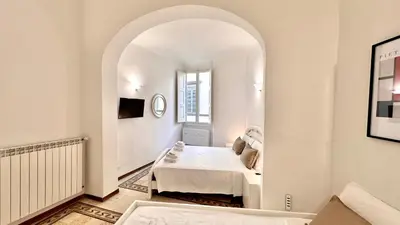 Letto o letti in una camera di Spada & Sole - Boutique Homes in Florence