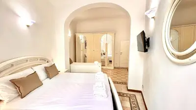 Letto o letti in una camera di Spada & Sole - Boutique Homes in Florence