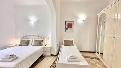 Letto o letti in una camera di Spada & Sole - Boutique Homes in Florence