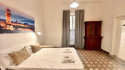 Letto o letti in una camera di Spada & Sole - Boutique Homes in Florence