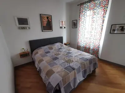 Letto o letti in una camera di Allori