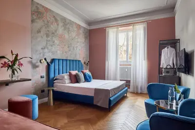 Letto o letti in una camera di Santarosa Rooms